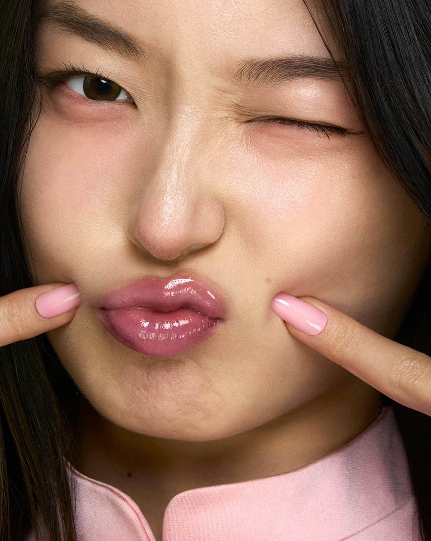 Yoonchae from KATSEYE wears Lip Glaze in Frosty.